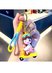 YELLOW SCOOTY GIRL KEYCHAIN