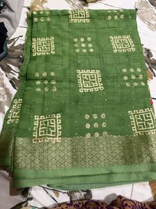 Elegant Green Saree with Intricate Designs