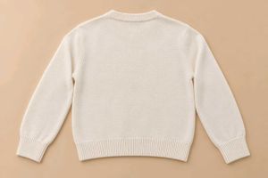IVORY SWEATER WITH BLACK BOW