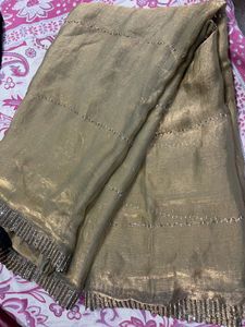 Elegant Golden Saree with Embellished Border