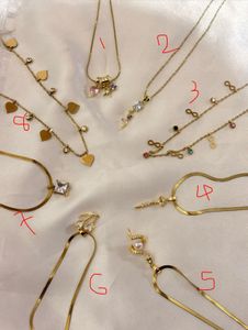 Elegant Gold Tone Charm Necklaces