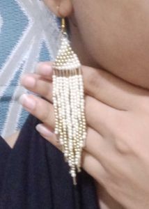 Dangling beaded earring