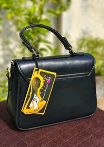 Chic Black Handbag with Embellished Detail