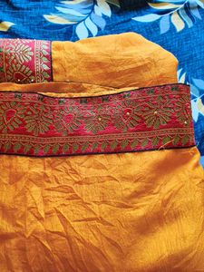 Vibrant Yellow Saree with Red Border