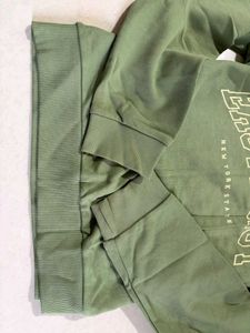 olive green sweatshirt