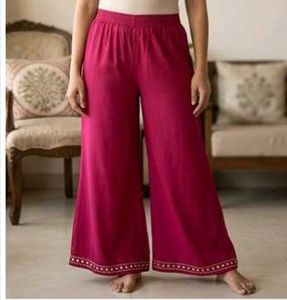 Vibrant Red Palazzo Pants with Embellished Hem