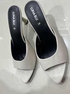 Elegant White Heeled Mules