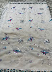 Elegant White Saree with Embellishments