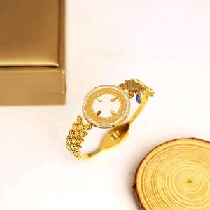 Elegant Gold Tone Bangle Bracelet