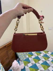Stylish Brown Handbag with Gold Chain Strap