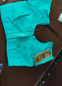 Elegant Teal Blouse with Golden Trim