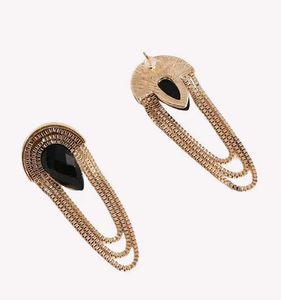 Elegant Gold Dangle Earrings with Black Stone
