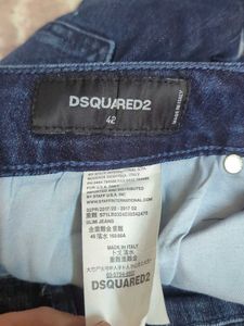 Stylish Dark Wash Jeans with Unique Embellishments