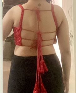 red backless blouse
