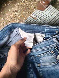 Light Blue Distressed Denim Jeans