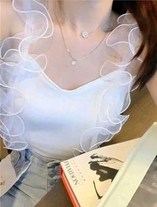 Chic Ruffle Trim Sleeveless Top-White