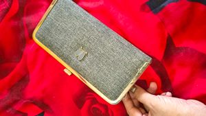 Elegant Grey Clutch with Gold Trim