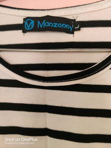 We Are Selling A Black &amp; White Striped Tshirt 👕