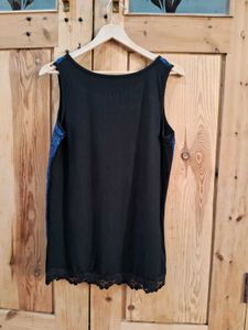 Elegant Blue Lace Top with Black Skirt