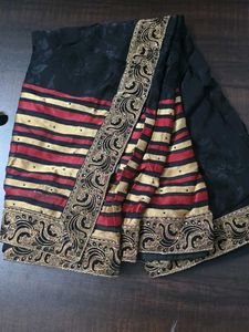 Elegant Black Saree with Red &amp; Gold Stripes