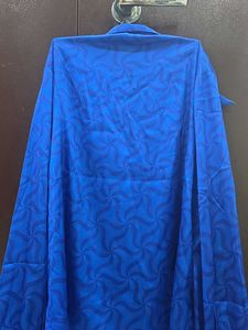 Vibrant Blue Button-Up Blouse with Geometric Patte
