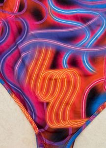 Vibrant Cut-Out Long Sleeve Top