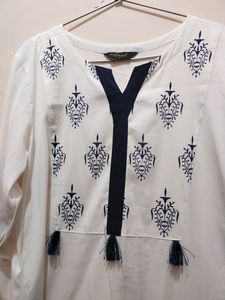White Colour Rayon Kurti .Full Sleev