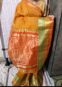 Vibrant Orange Saree with Green Border