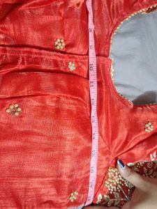 Red blouse with golden and pearl ambroidery