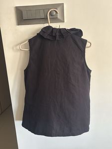 Sleeveless Black Blouse with Ruffle Collar