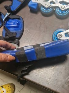 Blue and White Roller Blades