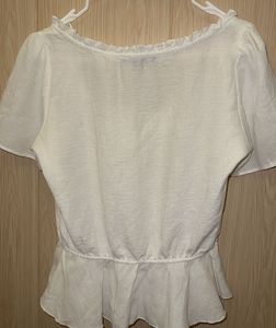 Whimsical White Ruffled Peplum Top