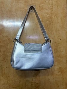 silver shoulder bag