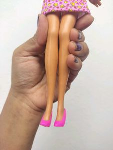Barbie doll with pink dress