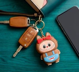 Cute Character Keychain with "BOOM!" Strap