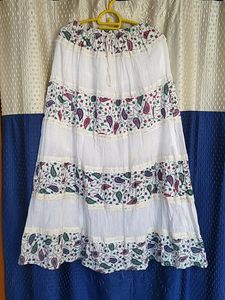 Beautiful  White Long Skirt With Printed Flowering Design Also With Lase