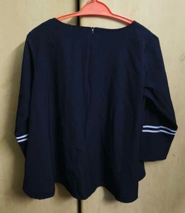 Chic Navy Top with Striped Accents