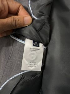 A professional Arrow Men's Grey Blazer