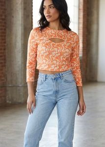 Orange Swirl Cut-Out Long Sleeve Top