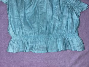 Ruffled Off-Shoulder Blouse.