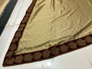 Elegant Cream and Red Saree with Gold Border