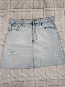 Light Wash Ripped Denim Mini Skirt