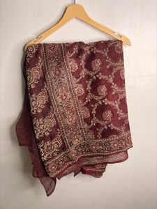 Elegant Maroon Silk Saree with Golden Floral Desig