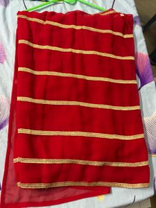Elegant Red Saree with Gold Border