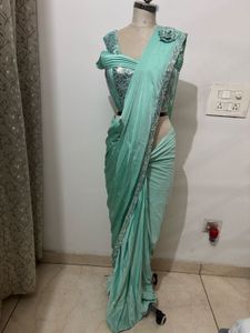 Elegant Mint Green Saree with Embellished Blouse