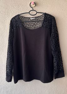 Chic Black Top with Leopard Print Sleeves