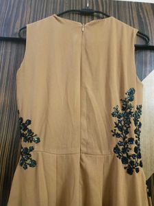 Elegant Beige Jumpsuit with Embellishments