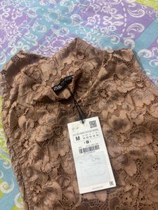 Sheer Lace Sleeveless Bodysuit