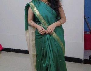Elegant Teal Green Saree with Gold Border
