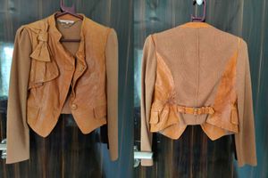 Knit Jacket with a burn mark